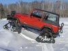 Jeep-Rubicon-Wrangler-Laredo-Limited-sport-snow-tracks.jpg